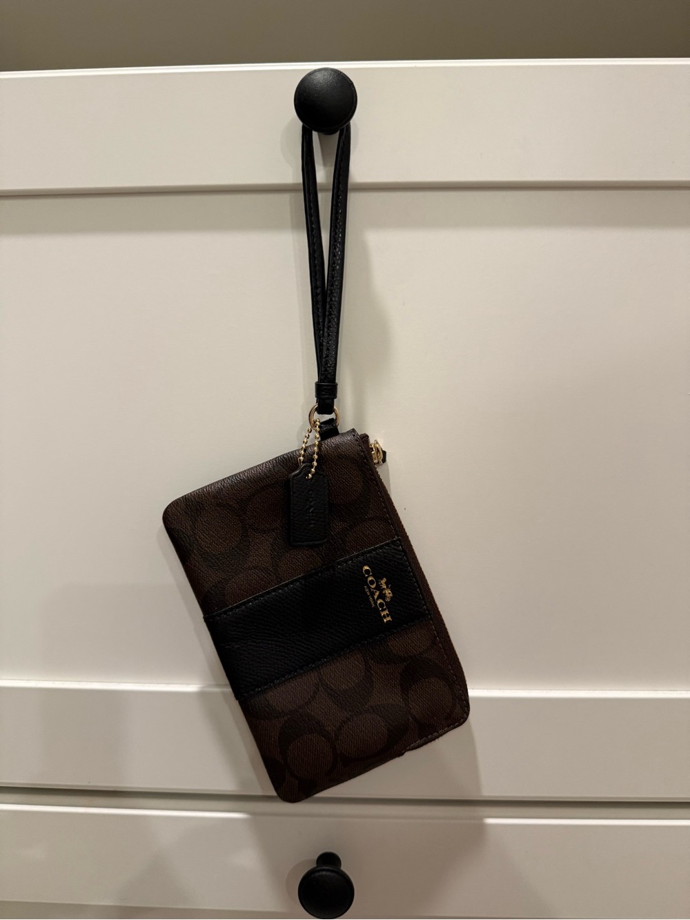 Coach Brown Signature Wristlet with Black Strap and Accent